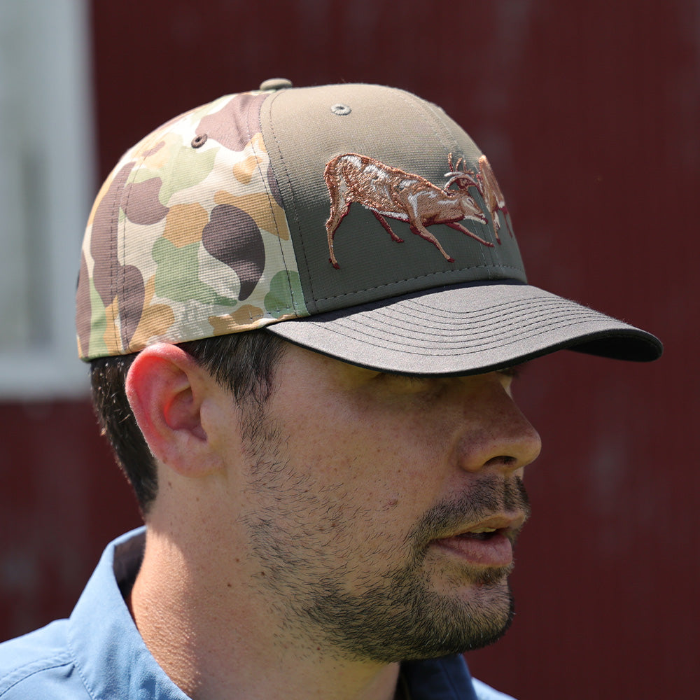 PARAMOUNT OUTDOORS™ Fighting Deer Rut Cap 6-Panel Riverside Wax Cloth Visor Headwear